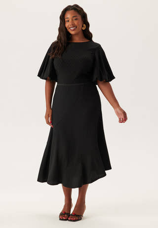 Structured Asymmetric Skirt